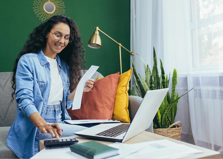 woman reviewing receipts